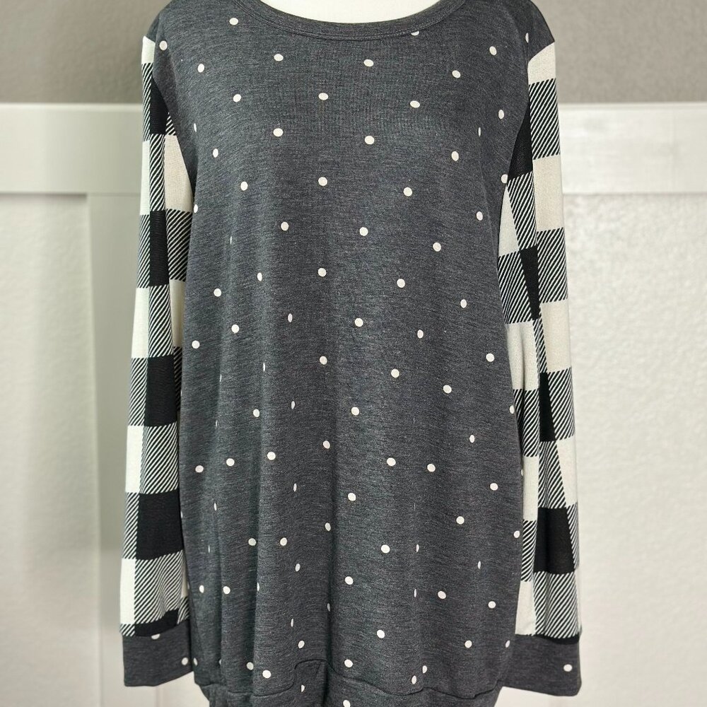 Polka dot and plaid top.